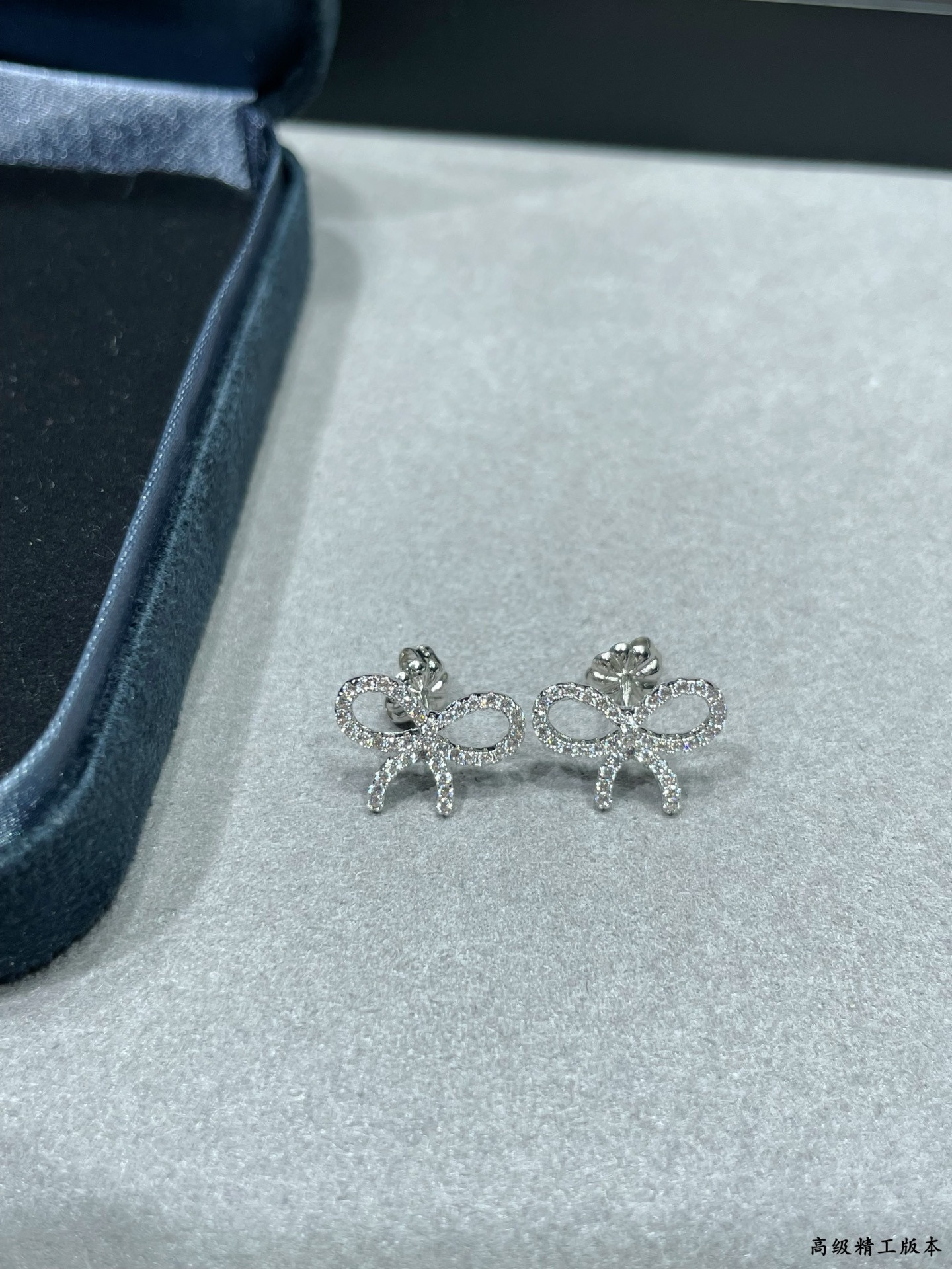 t*f*ny & co. D1am0nd-encrusted bow stud earrings