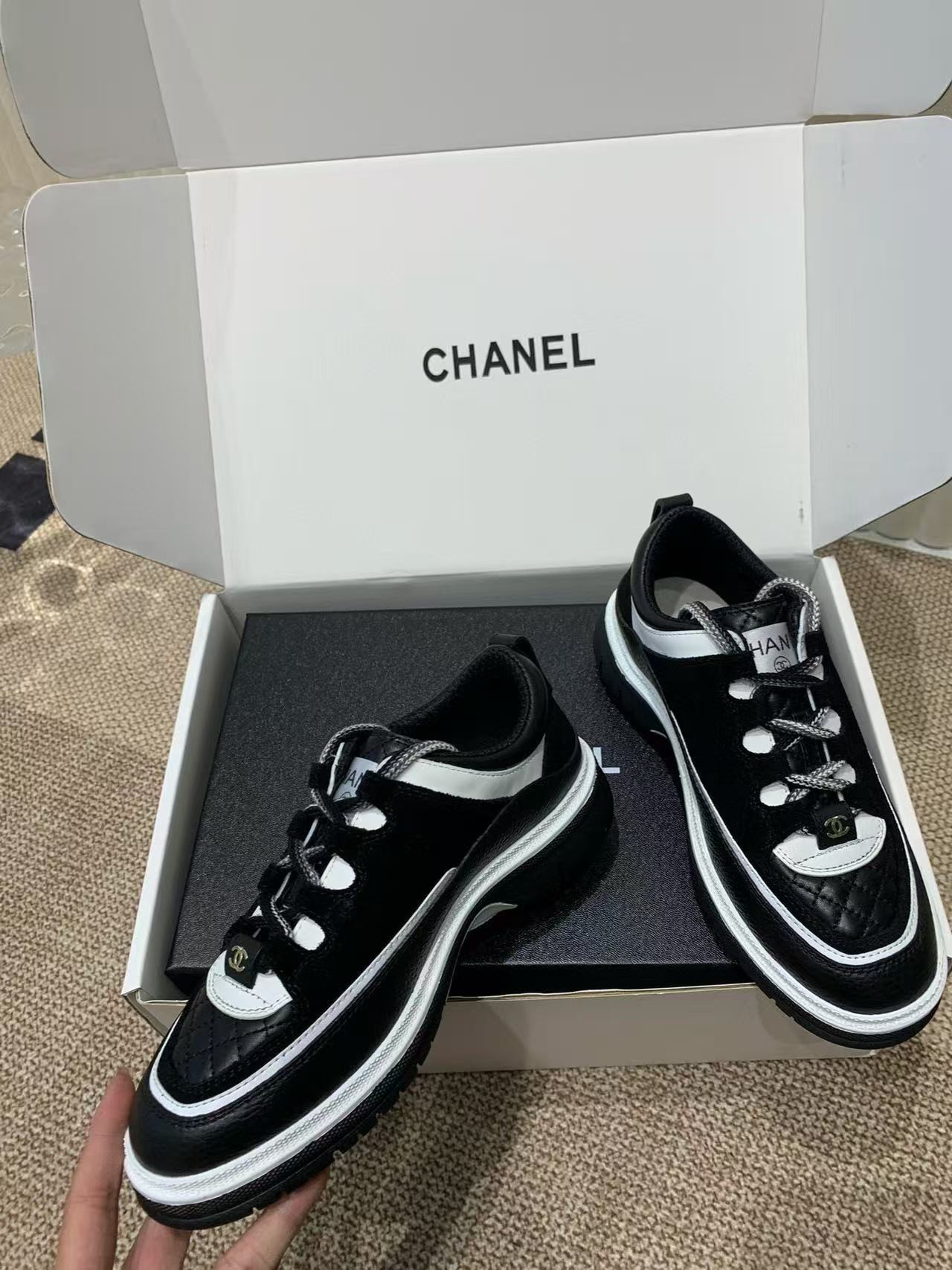 UA Ch**el Sneaker