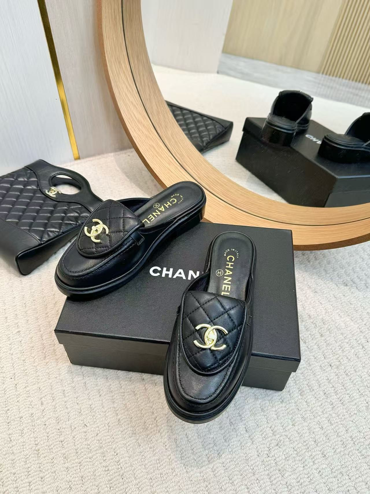 UA Ch**el Slides Leather Flats