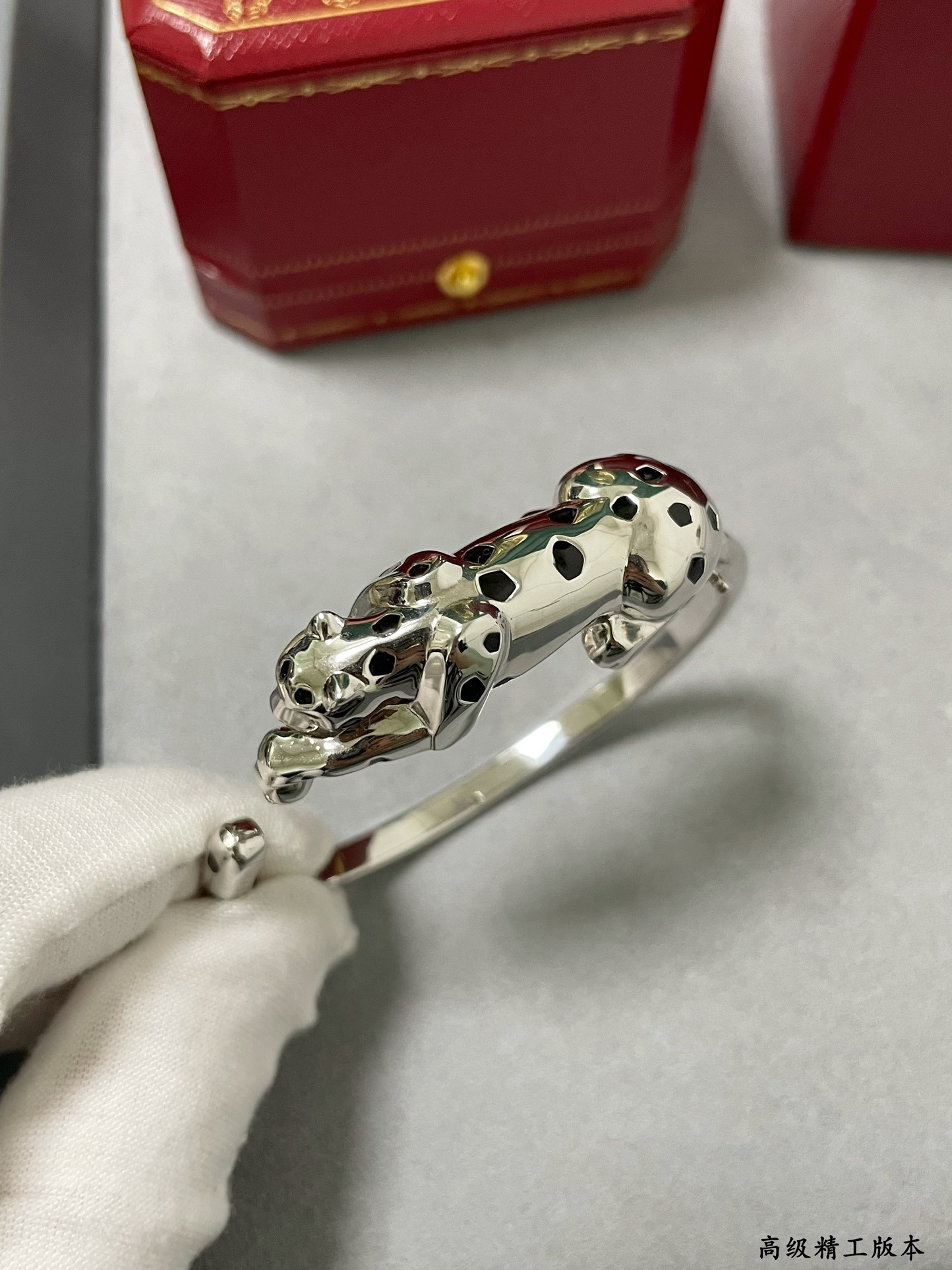 Ca*t1er Light Gold Spotted Leopard Bracelet