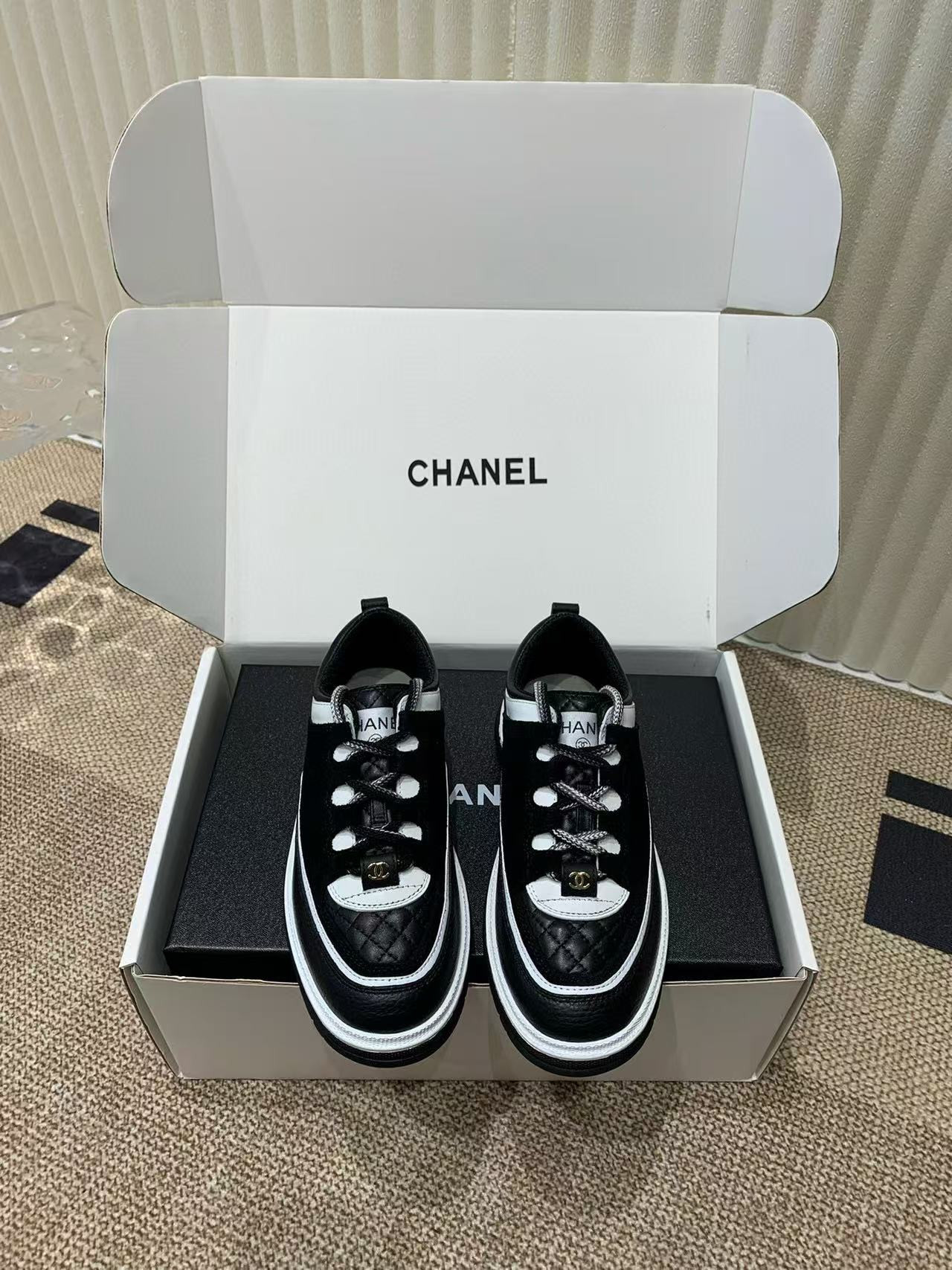 UA Ch**el Sneaker