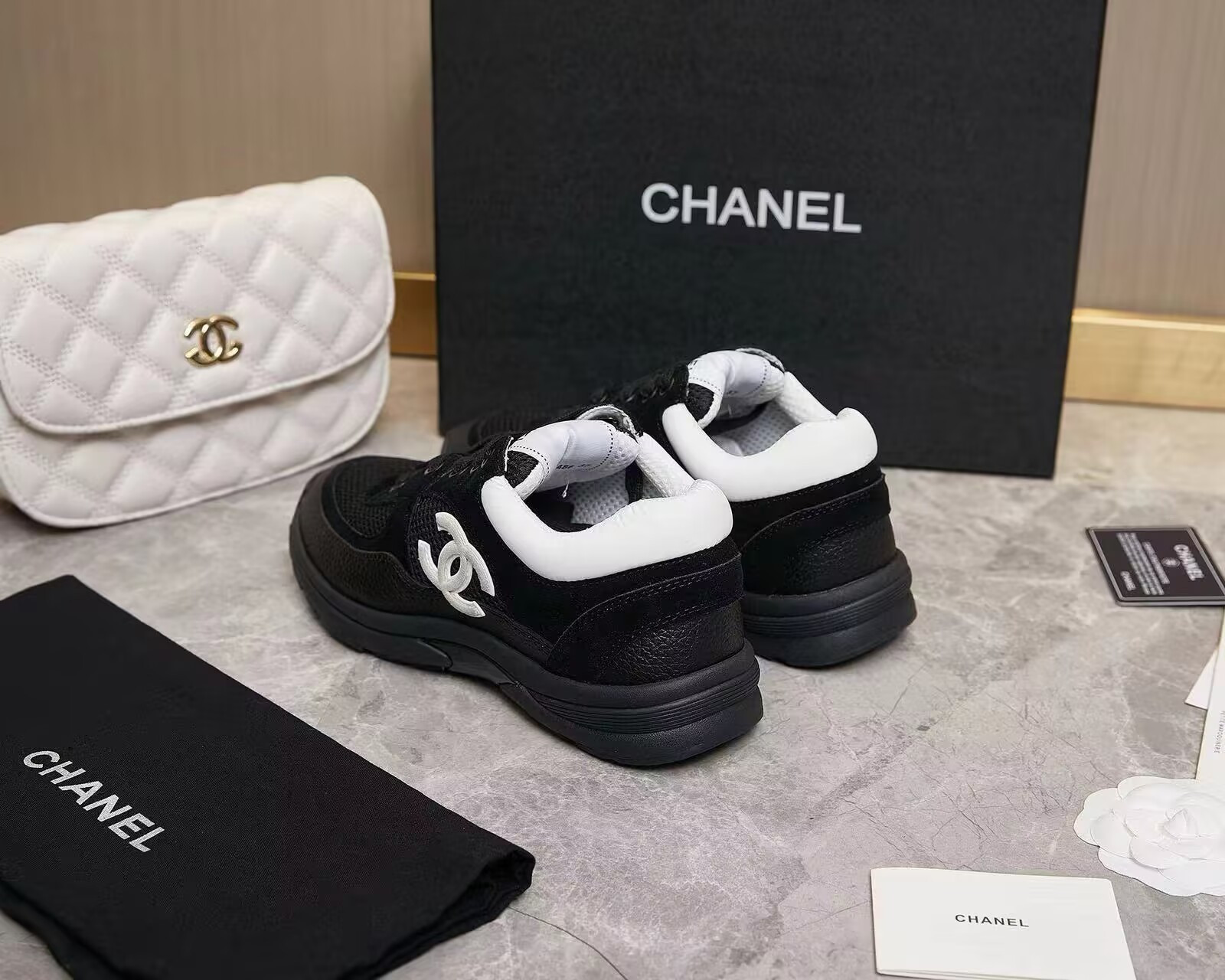 UA Ch**el SNEAKER