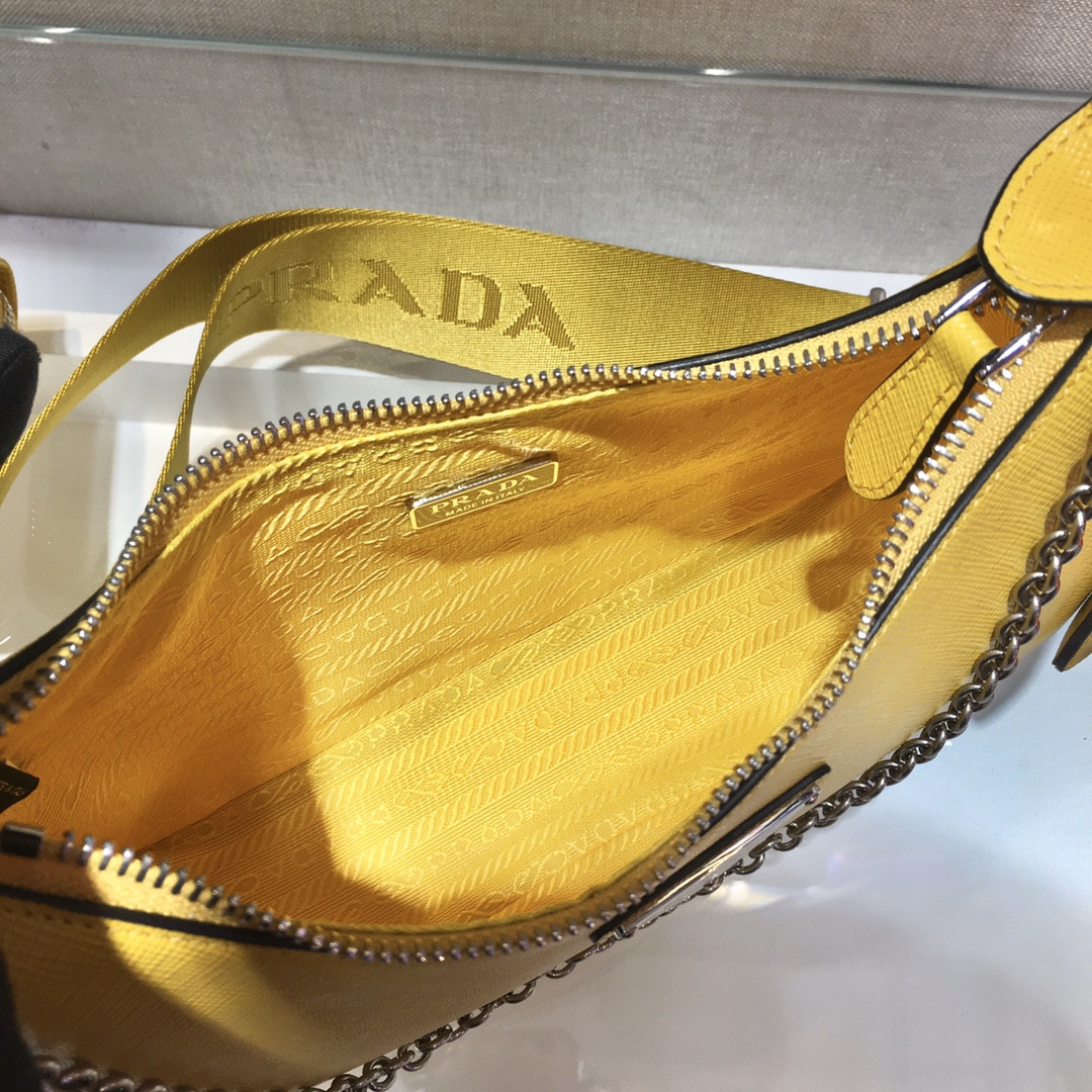 Pra*a Re-Edition 2005 Saffiano leather bag dark yellow