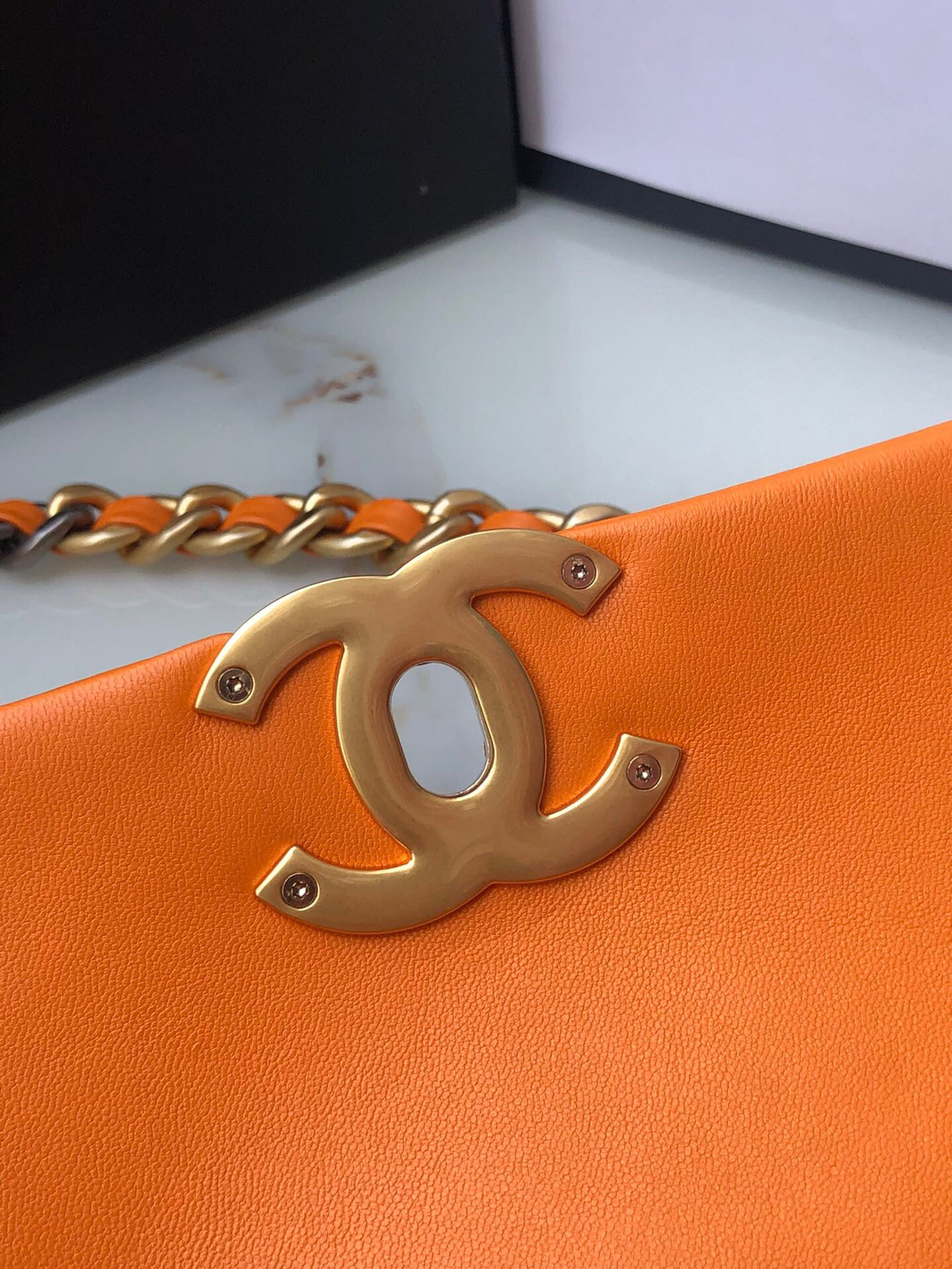 Ch**el 19 HANDBAG Shiny Leather, Gold-Tone, Silver-Tone & Ruthenium-Finish Metal Orange 6.2 × 10.1 × 3.5 in