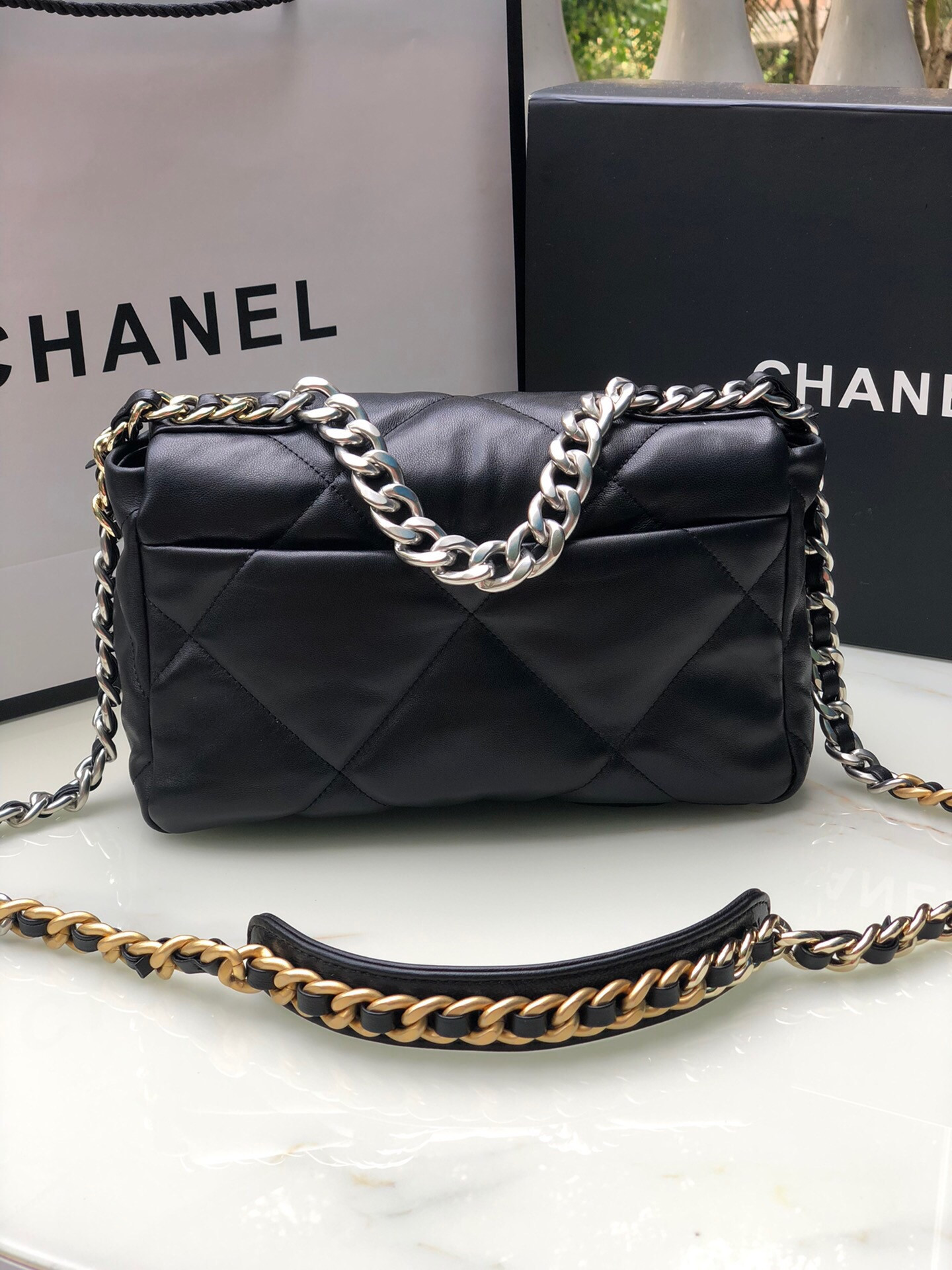 Ch**el 19 HANDBAG Shiny Leather, Gold-Tone, Silver-Tone & Ruthenium-Finish Metal Black 6.2 × 10.1 × 3.5 in