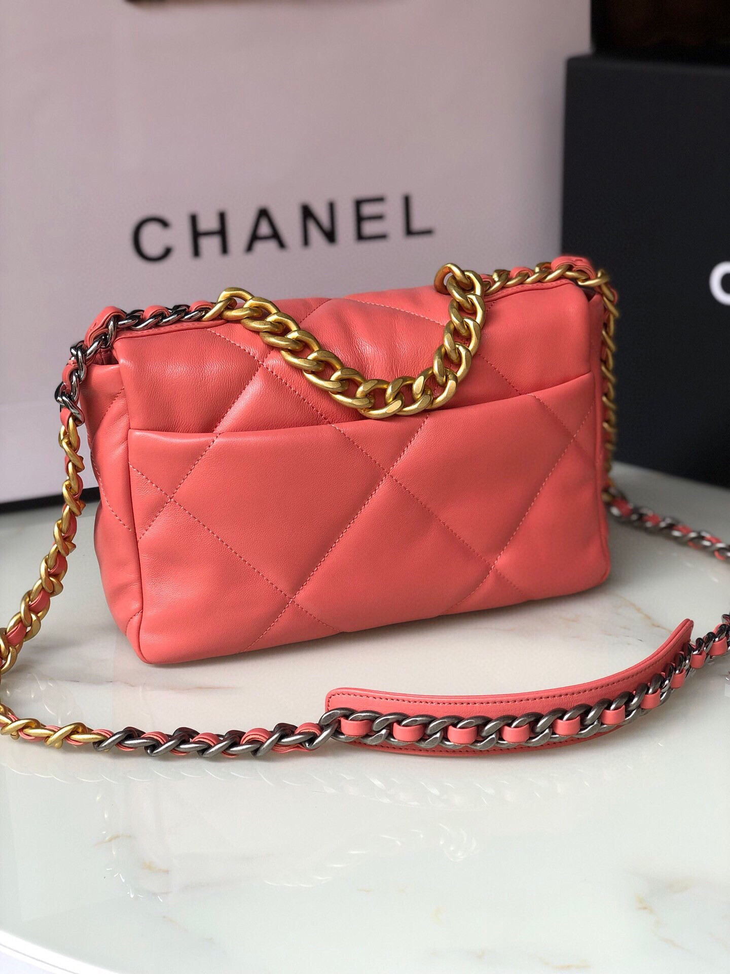 Ch**el 19 HANDBAG Shiny Pink Gold-Tone, Silver-Tone & Ruthenium-Finish Metal 6.2 × 10.1 × 3.5 in
