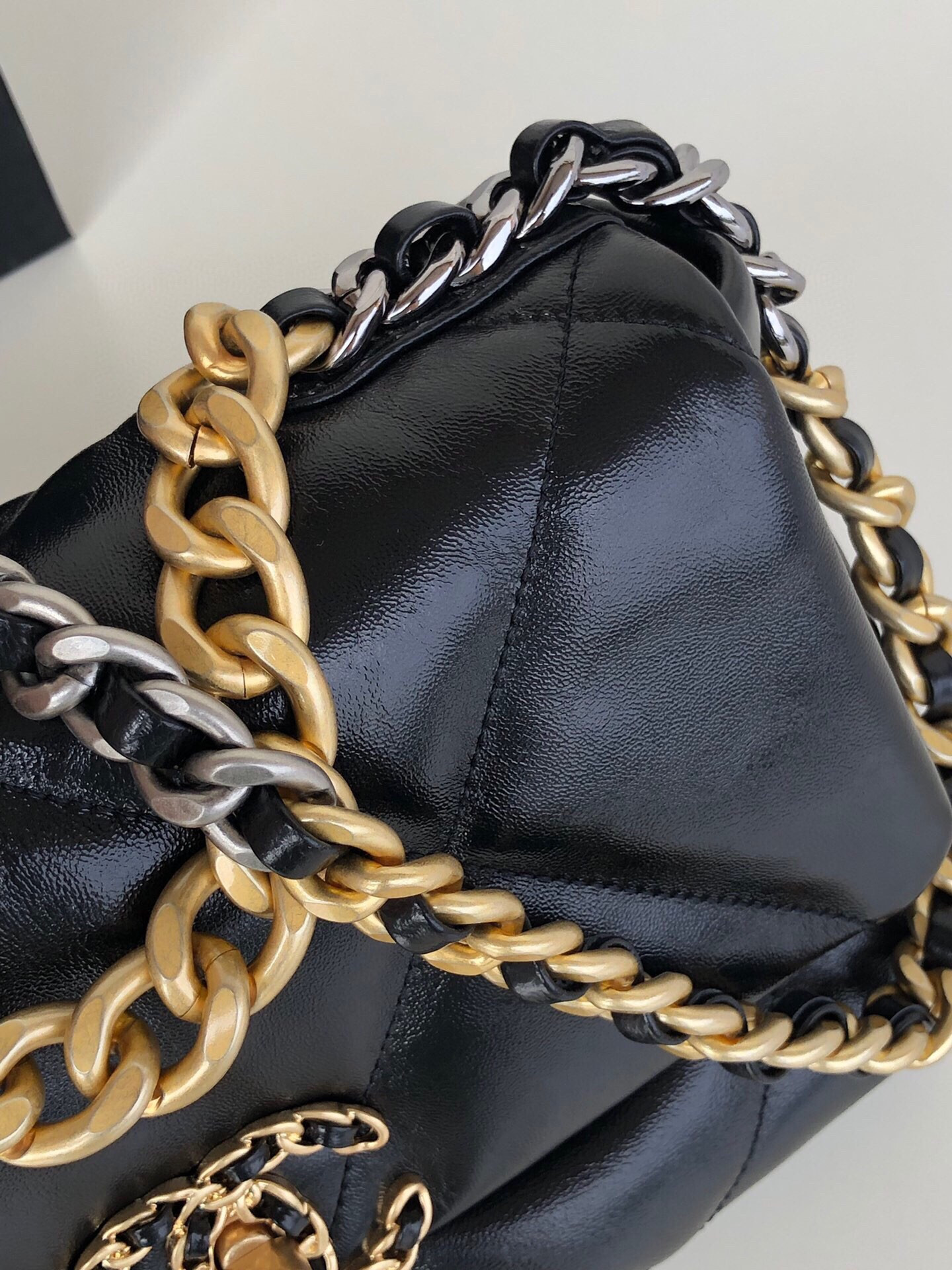 Ch**el 19 HANDBAG Shiny Leather, Gold-Tone, Silver-Tone & Ruthenium-Finish Metal Black 6.2 × 10.1 × 3.5 in