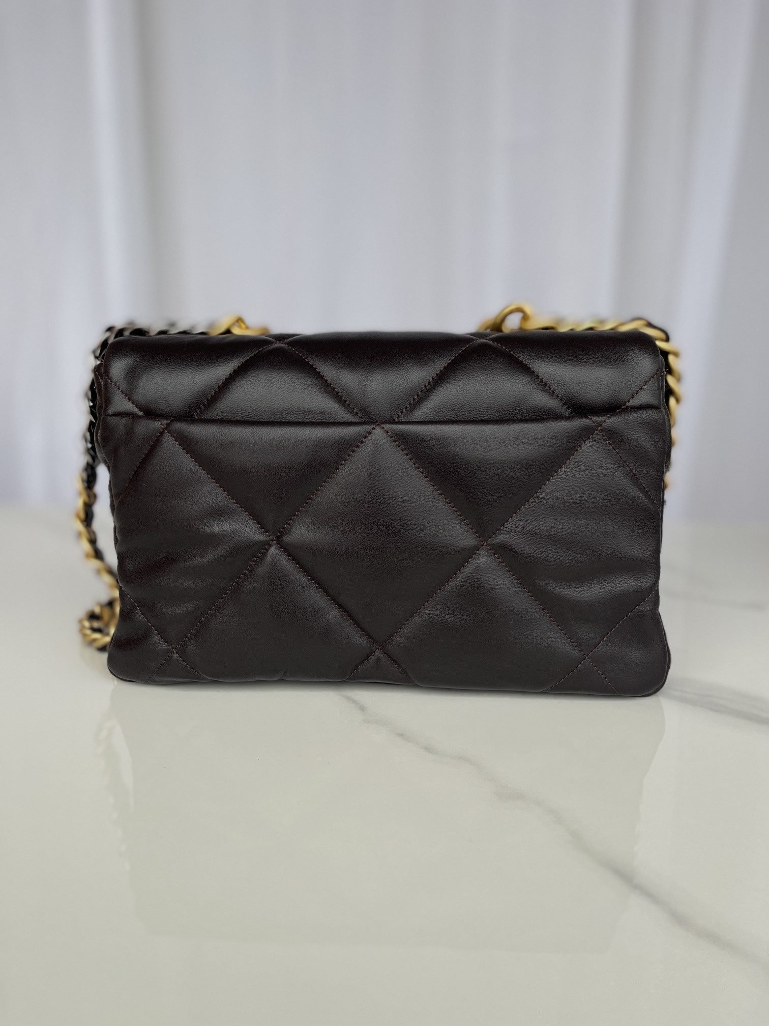 Ch**el 19 LARGE HANDBAG Shiny Leather, Gold-Tone, Silver-Tone & Ruthenium-Finish Metal Black 7.8 × 11.7 × 3.9 in
