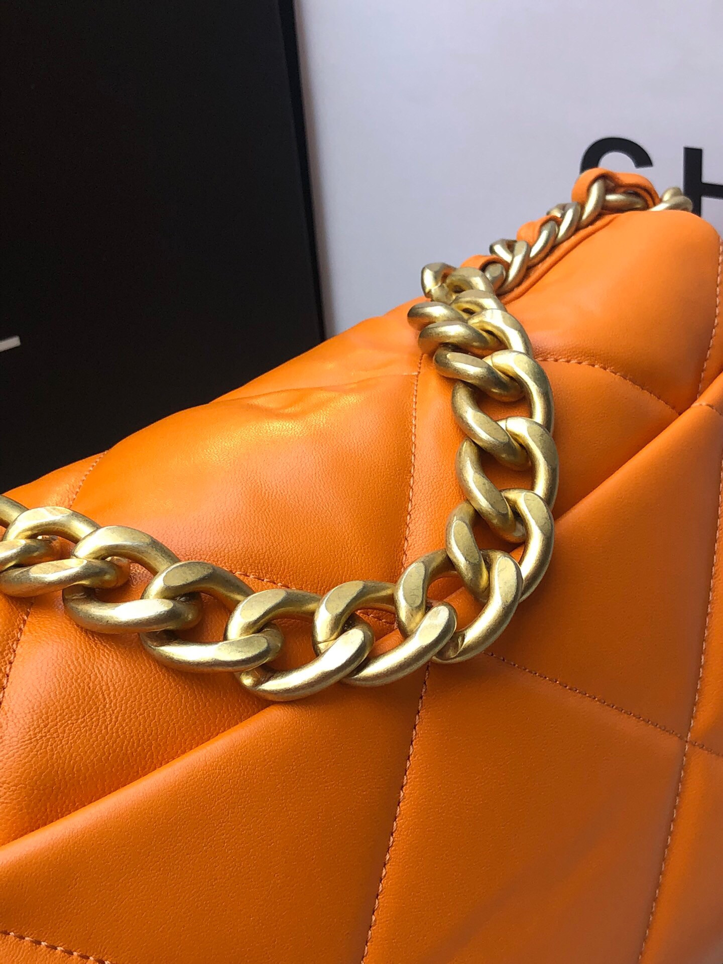 Ch**el 19 LARGE HANDBAG Shiny Leather, Gold-Tone, Silver-Tone & Ruthenium-Finish Metal Orange 7.8 × 11.7 × 3.9 in