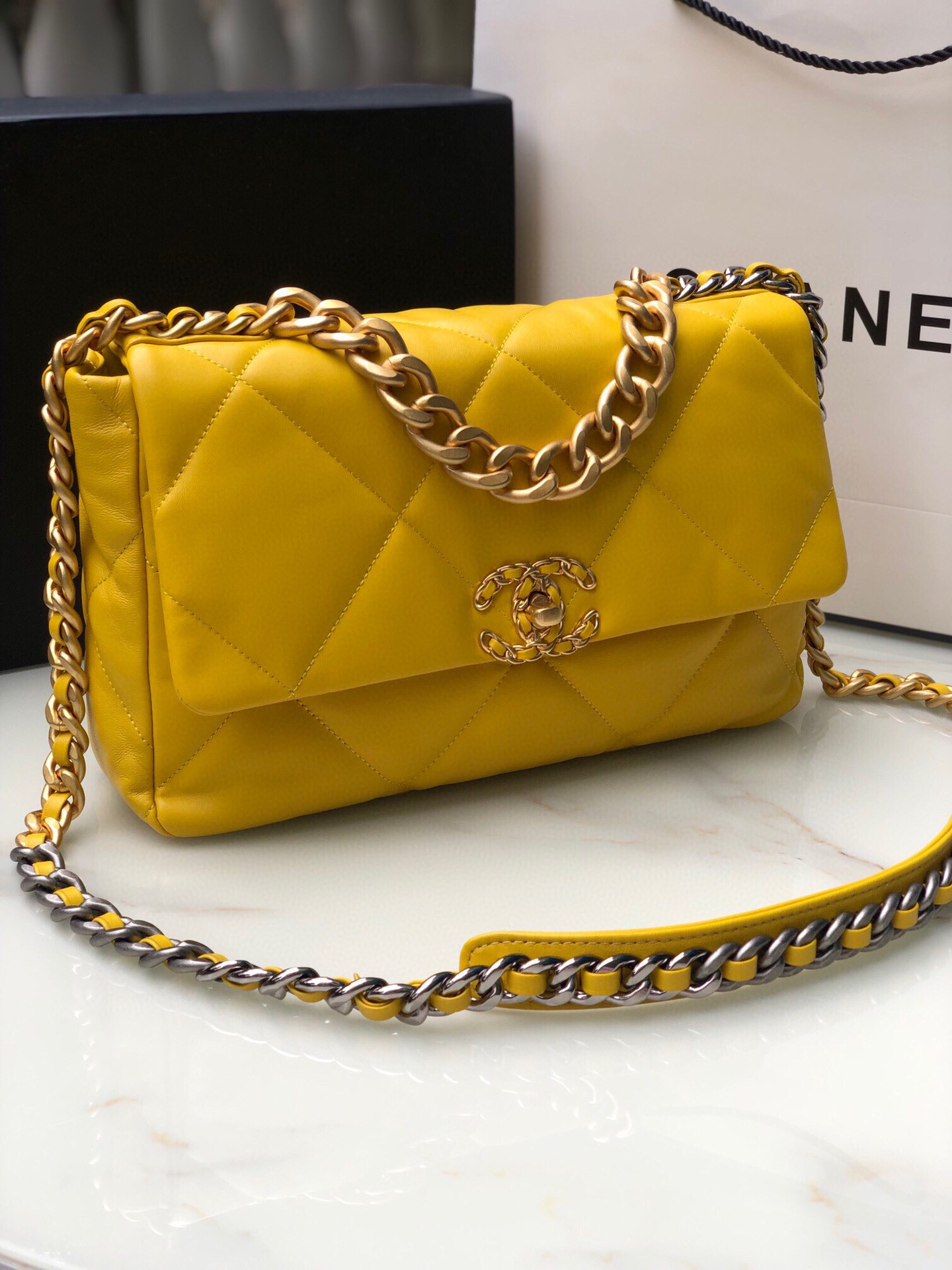 Ch**el 19 LARGE HANDBAG Shiny Leather, Gold-Tone, Silver-Tone & Ruthenium-Finish Metal Yellow 7.8 × 11.7 × 3.9 in