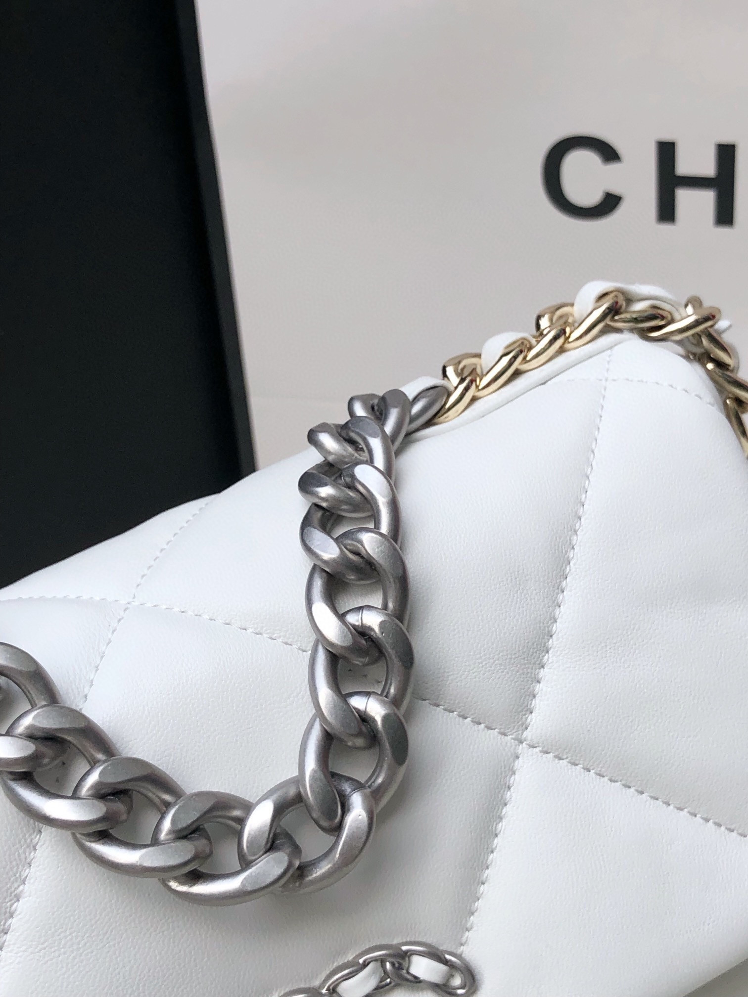 Ch**el 19 HANDBAG Shiny Leather, Gold-Tone, Silver-Tone & Ruthenium-Finish Metal White 6.2 × 10.1 × 3.5 in