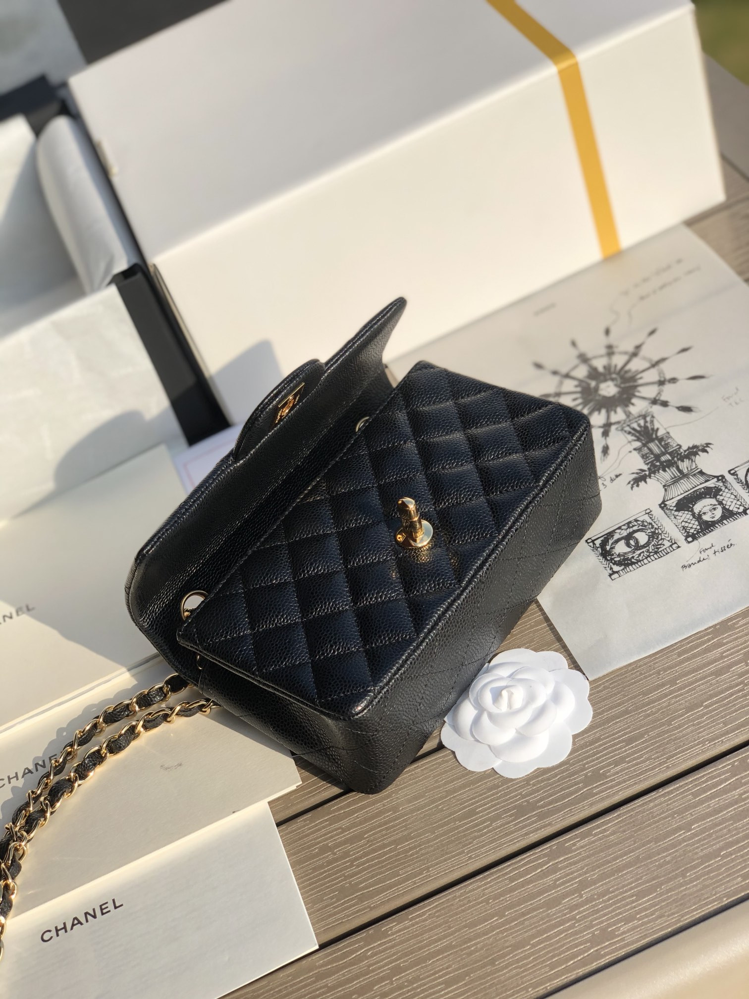 Ch**el MINI FLAP BAG BLACK WITH GOLD-TONE MENTAL 4.7 × 7.8 × 2.3 in