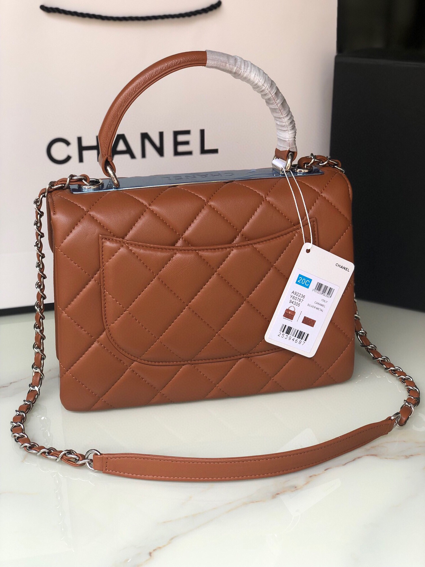 Ch**el FLAP BAG WITH TOP HANDLE 6.6 × 9.8 × 4.7 in