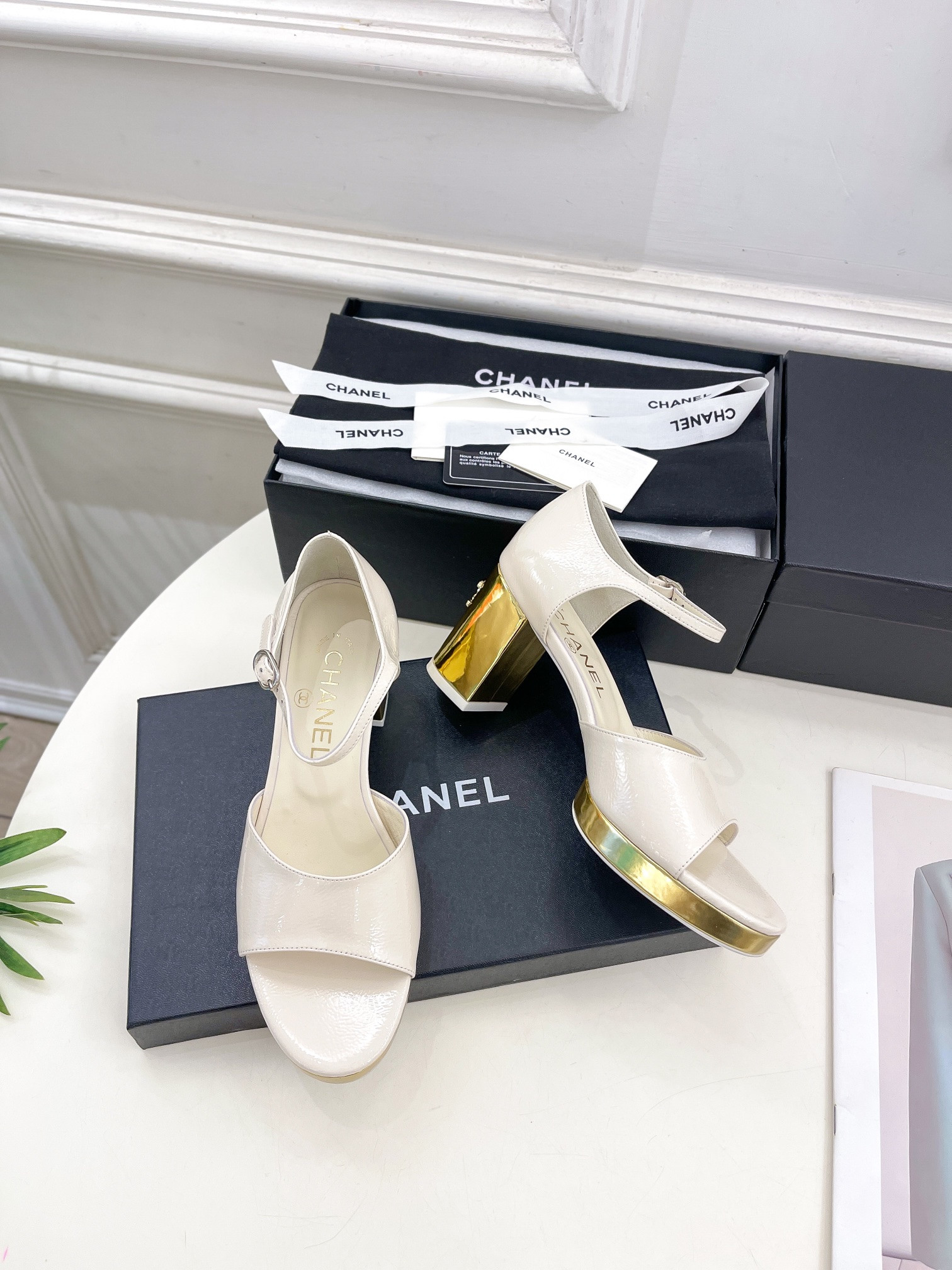 UA Ch**el HEELED SANDALS