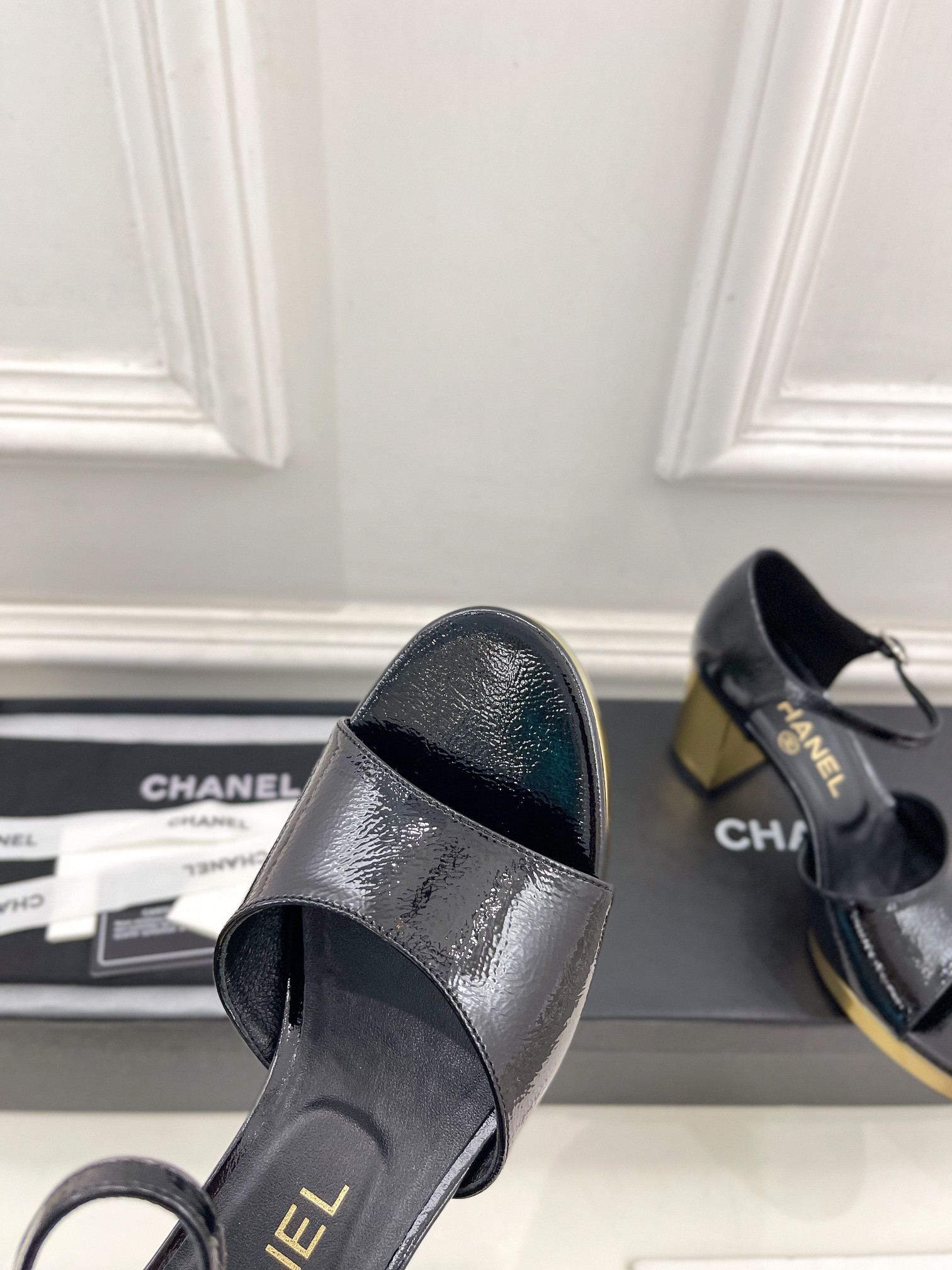 UA Ch**el HEELED SANDALS
